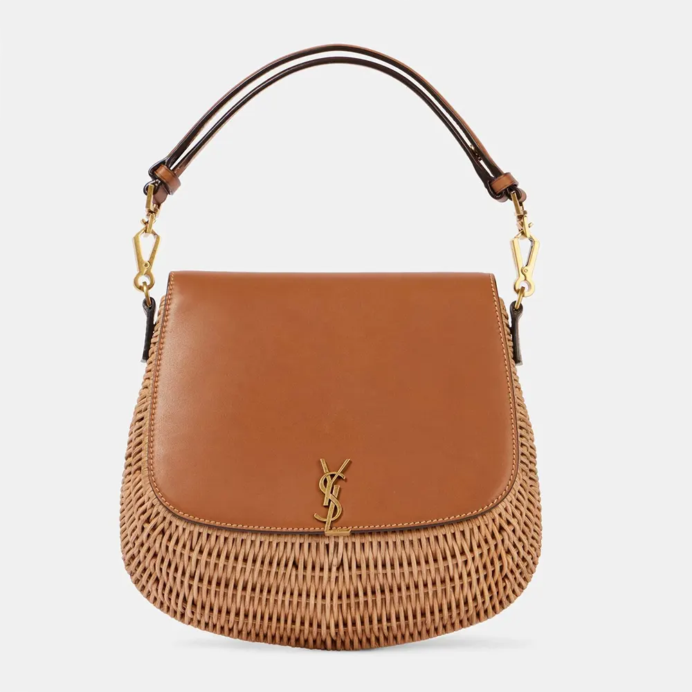 Close-up on gold-tone YSL logo hardware on Saint Laurent YSL Women Mini Voltaire bag