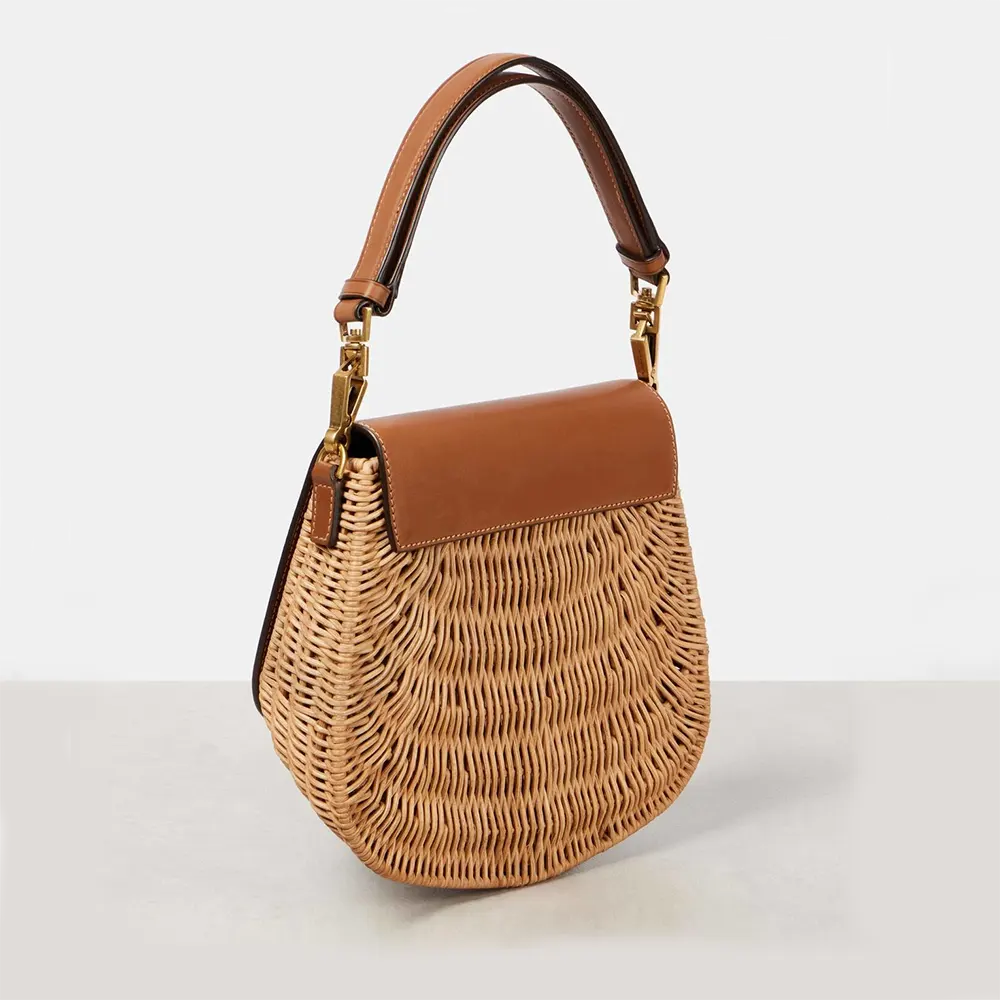 Side profile showing structured silhouette of Saint Laurent YSL Women Mini Voltaire Top Handle Bag