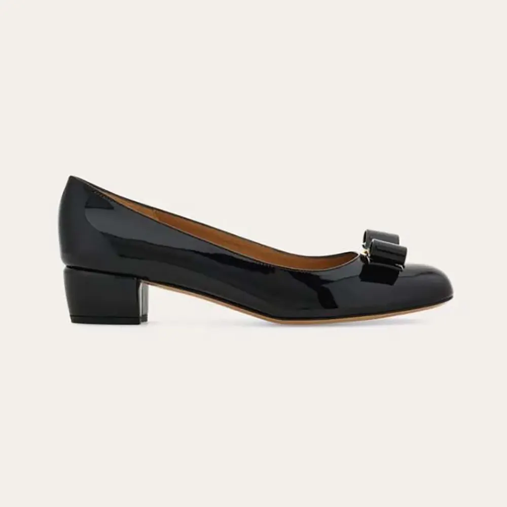 Side view of Salvatore Ferragamo Women Vara Pump-Black showing silhouette