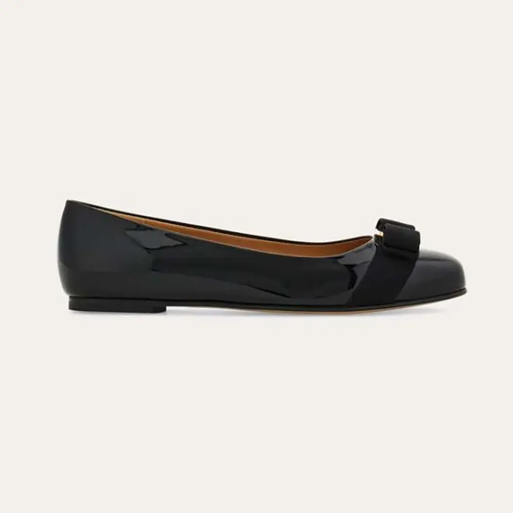 Side view of Salvatore Ferragamo Women Varina Ballet Flat-Black showing sleek silhouette