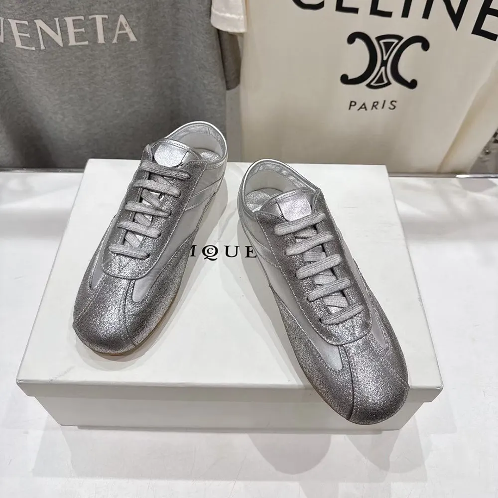 Top view showing laces and padded collar of Alexander Mcqueen Unisex Boxe Sneaker in Silver