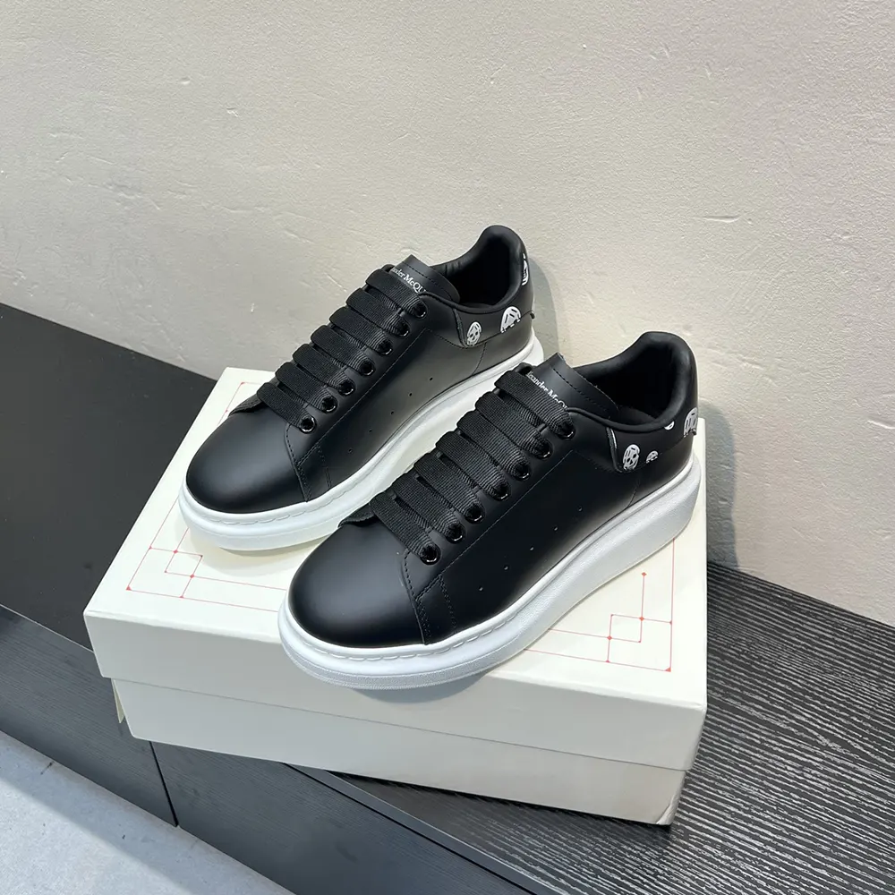Top view showing laces and leather texture on Alexander Mcqueen Unisex Oversized Sneaker