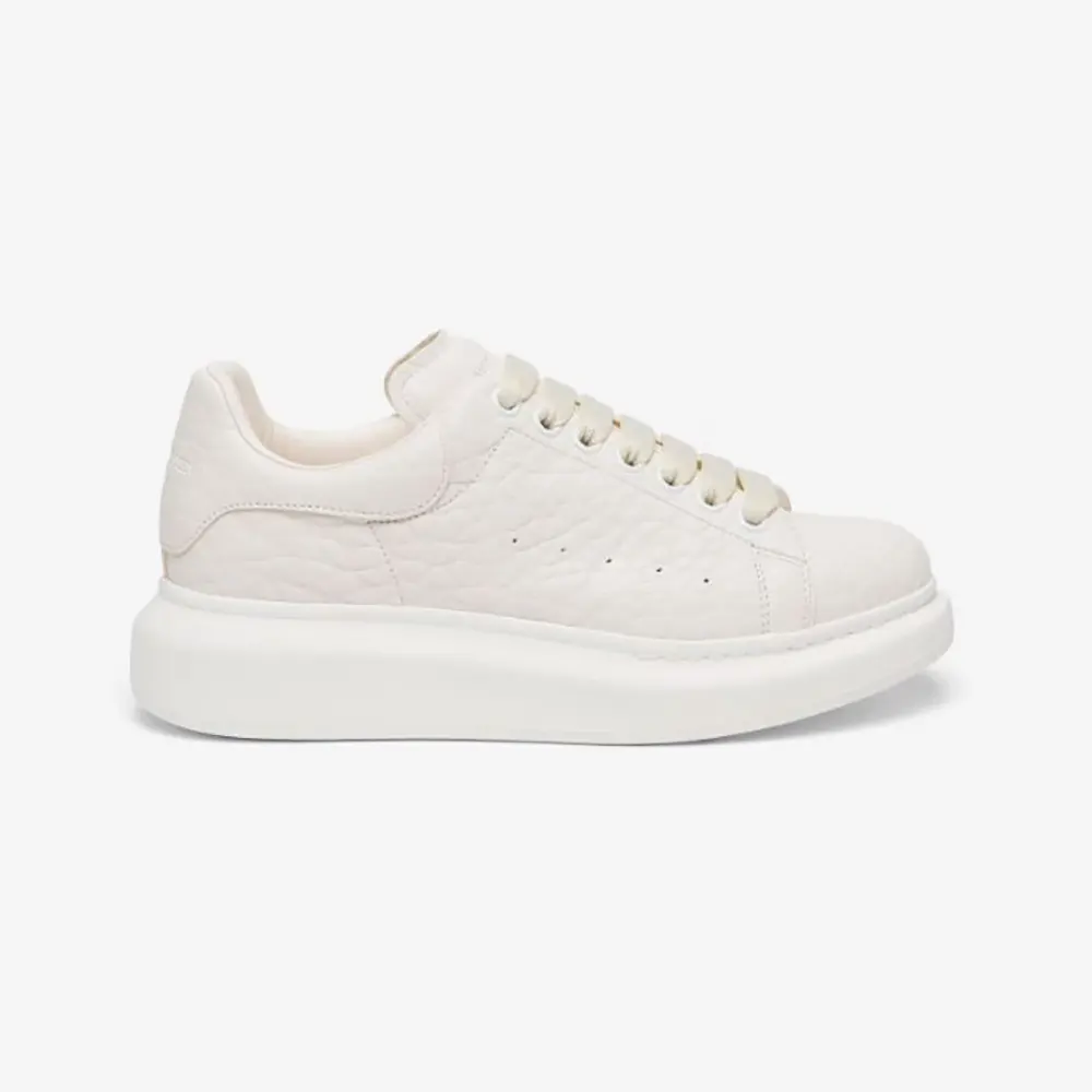 Side profile of Alexander Mcqueen Unisex Oversized Sneaker in Off White