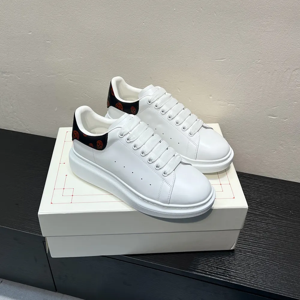 Top view showing white leather and laces of Alexander Mcqueen Unisex Oversized Sneaker