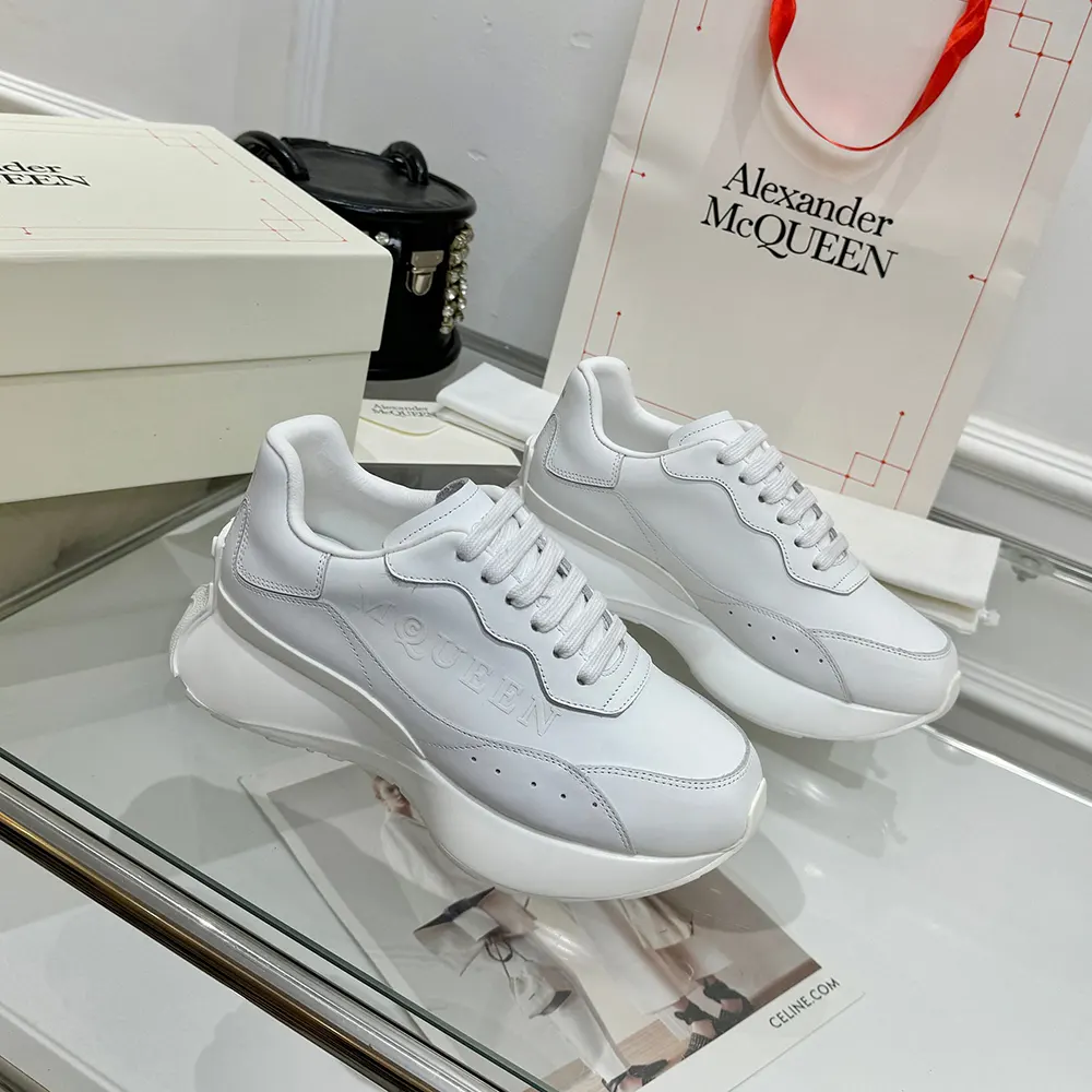 Close-up of white leather and oversized sole on Alexander Mcqueen Sprint Runner
