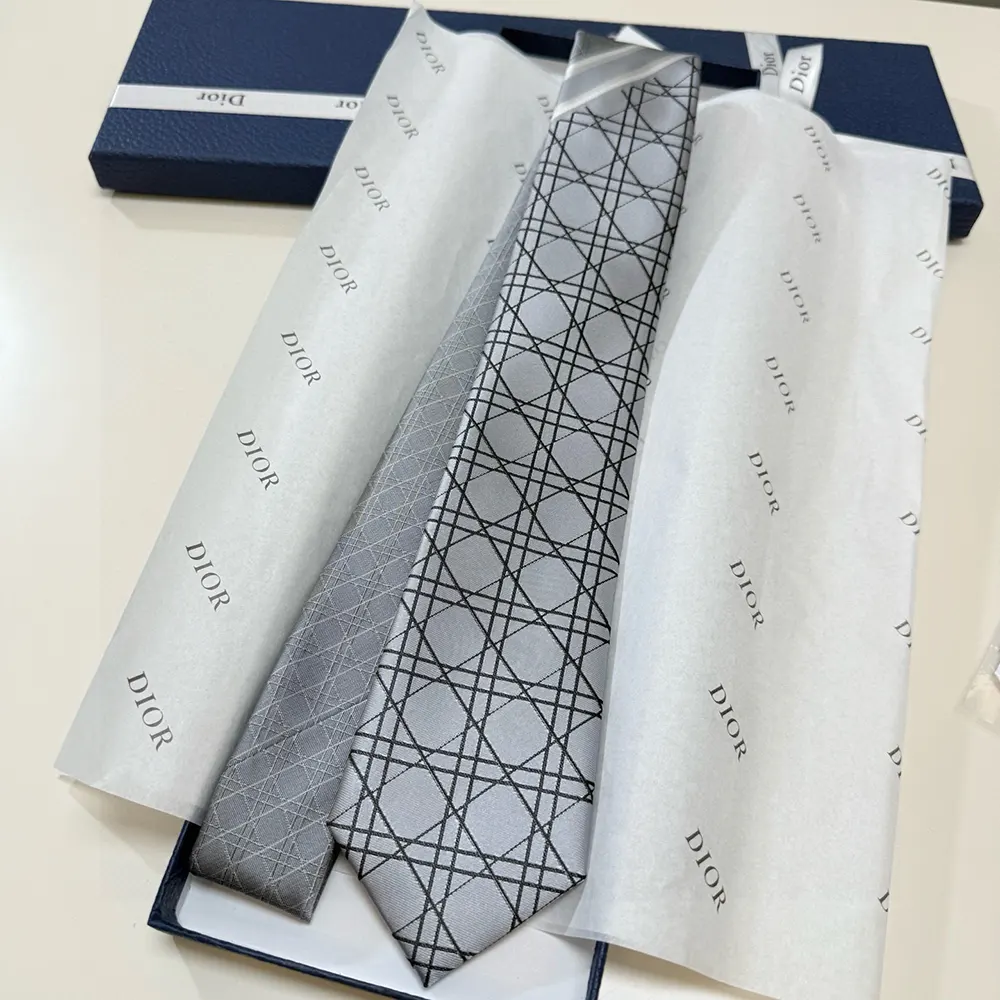 Close-up of signature striped Cannage pattern on Dior Men Striped Cannage Tie