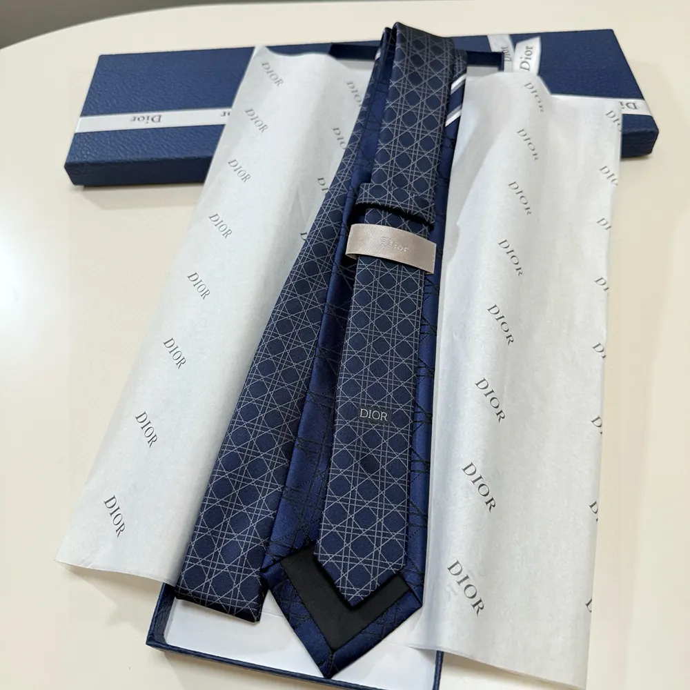 Close-up detail of Dior Cannage stitching on the Dior Men Striped Cannage Tie