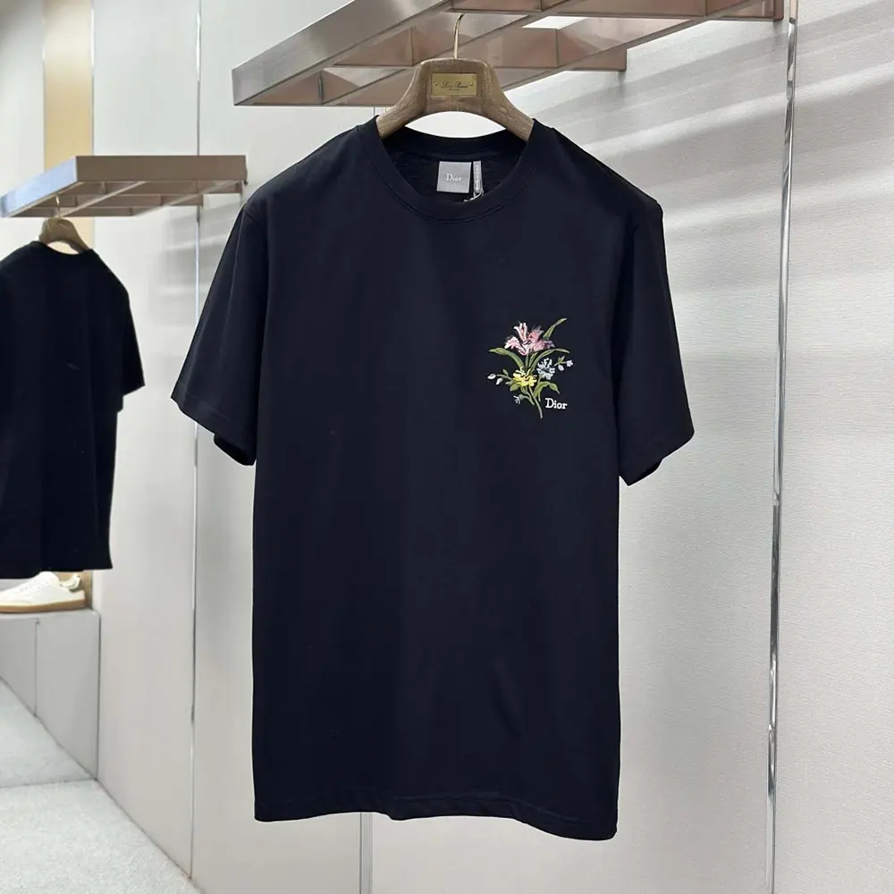Side angle showing relaxed fit of Dior Women T-Shirt in black