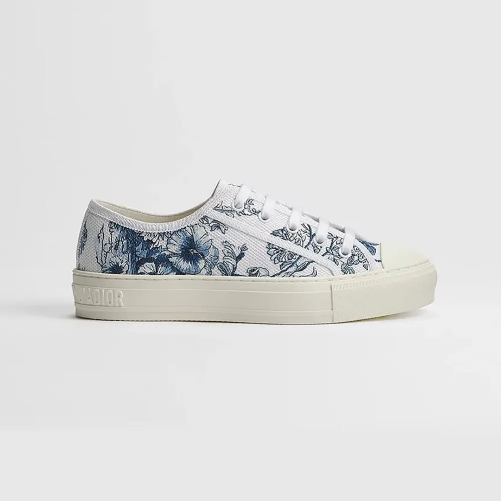 Side view of Dior Women Dioriviera Walk’n’Dior Sneaker in blue toile de Jouy