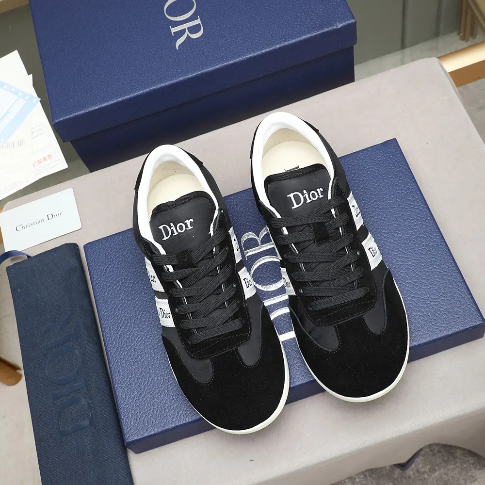 Close-up on black suede calfskin and ribbon detail of Dior sneaker