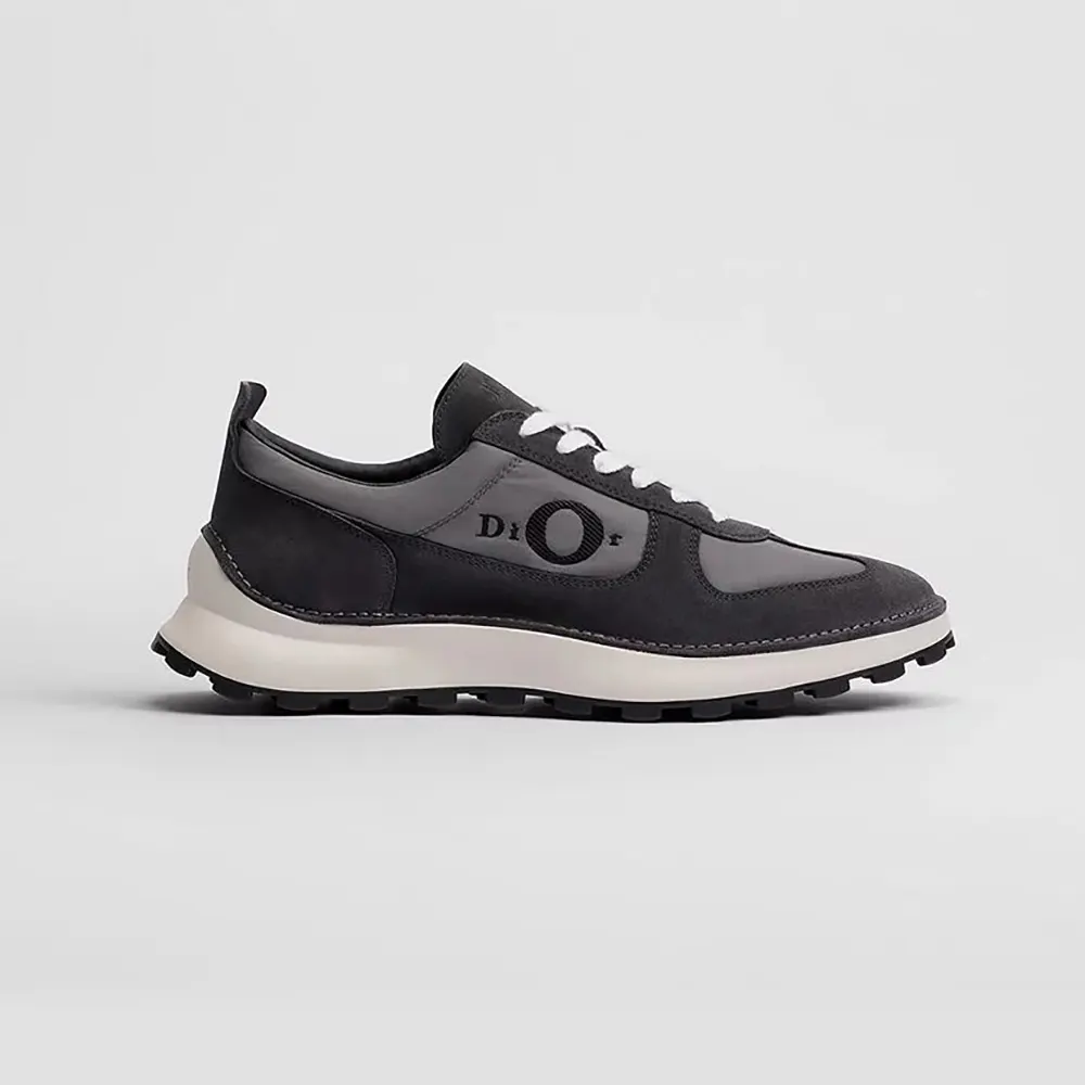 Side view of Dior Unisex Squash Sneaker Black Suede Calfskin and Gray Technical Fabric