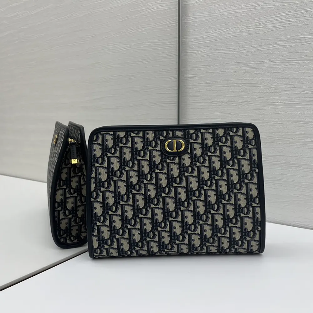 Close-up detail of silver zipper on Dior Women 30 Montaigne Dea Pouch Blue