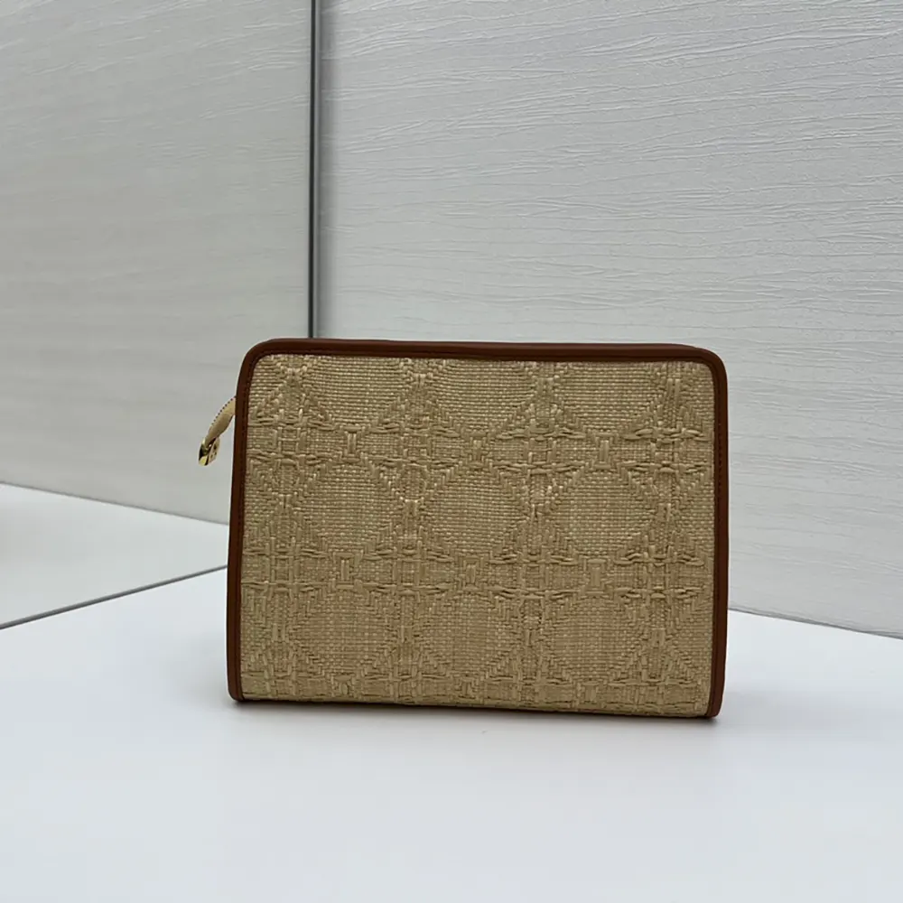Side angle showing silver hardware on Dior Women 30 Montaigne Dea Pouch