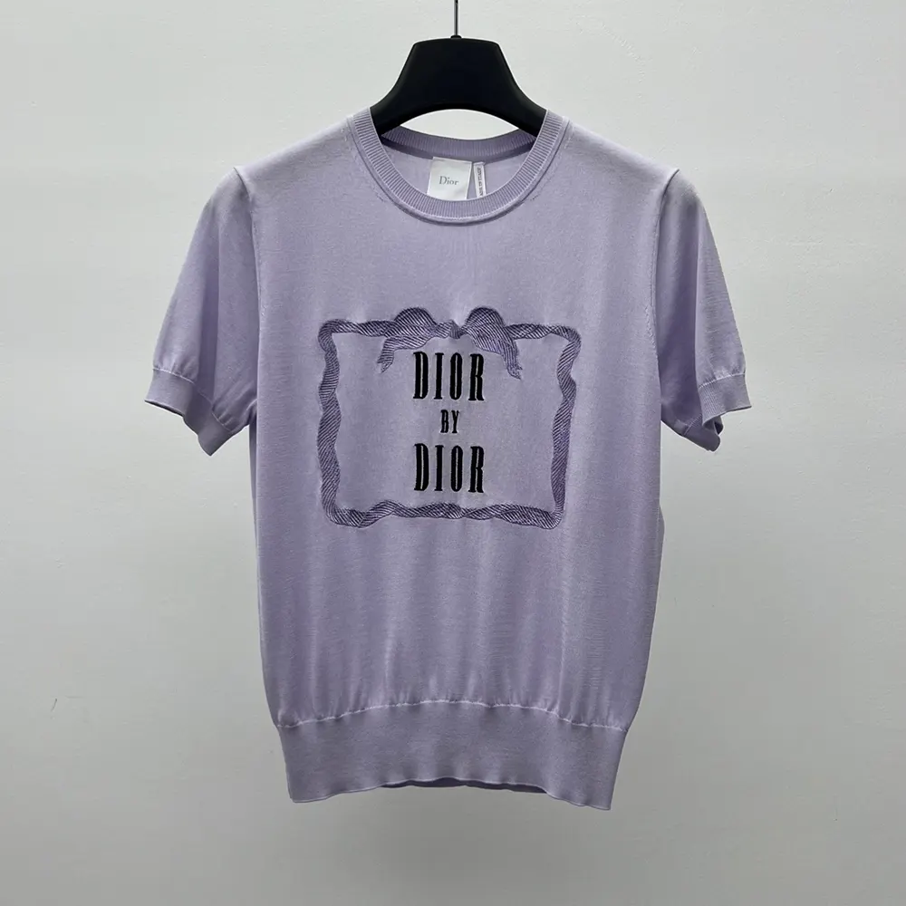 Side angle highlighting drape of Dior Women Book Cover Short-Sleeved Sweater