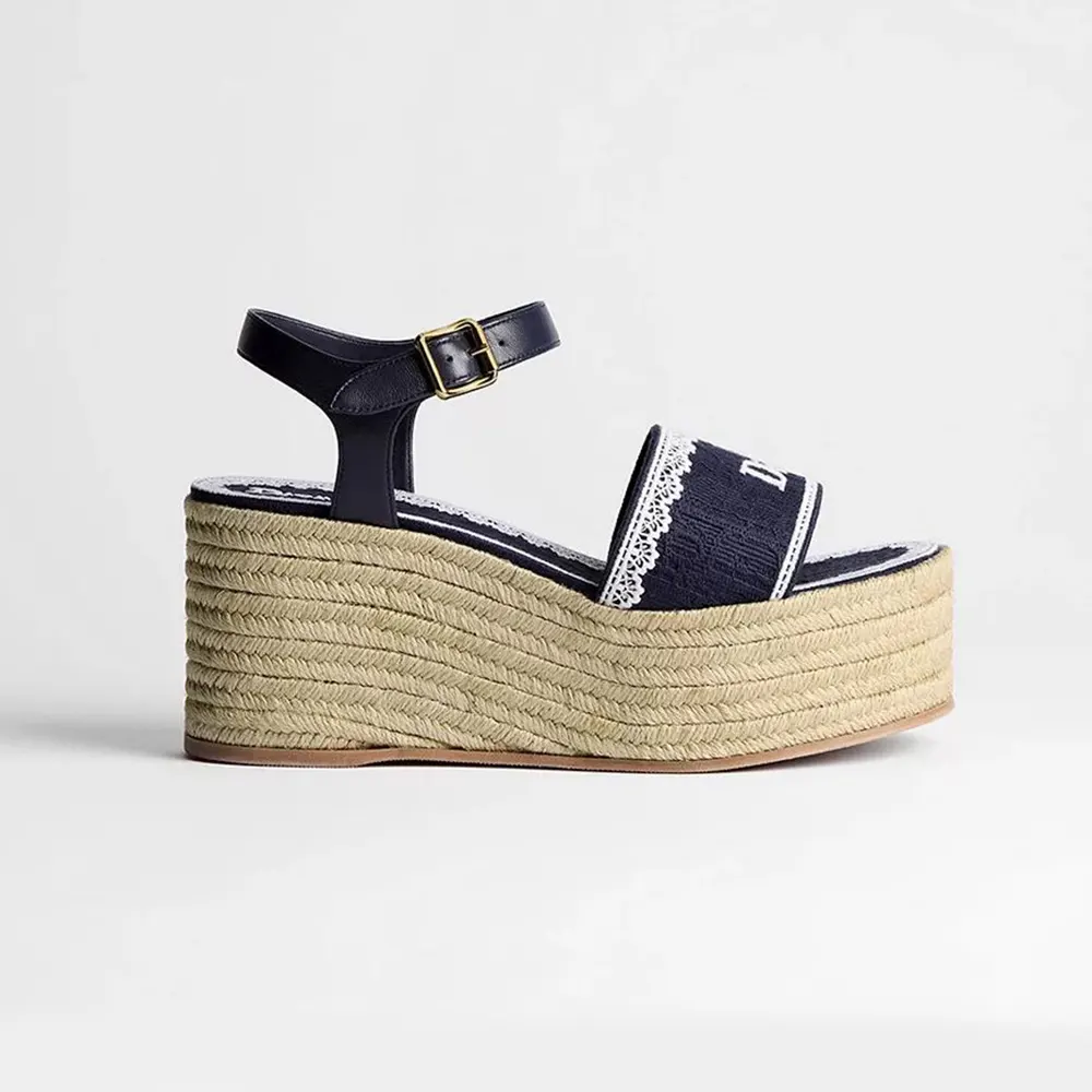 Side profile of Dior Women Dentelle Wedge Sandal navy blue with oblique embroidery
