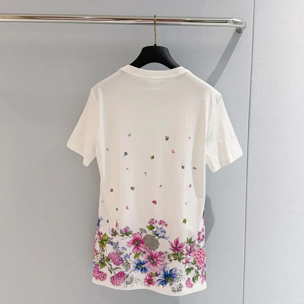 Side angle showing fitted silhouette and white cotton fabric texture