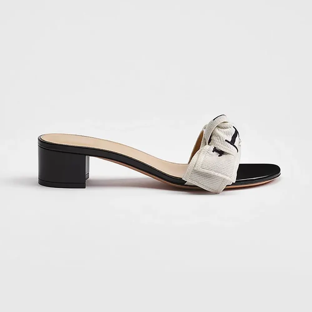 Side view of Dior Women J’Adior Heeled Slide Black Embroidered Cotton
