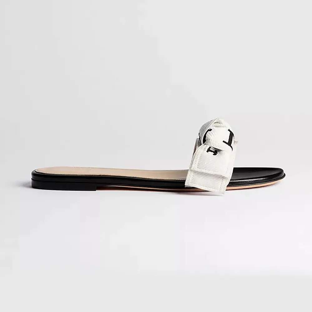 Side view of Dior Women J’Adior Slide Black Embroidered Cotton sandal