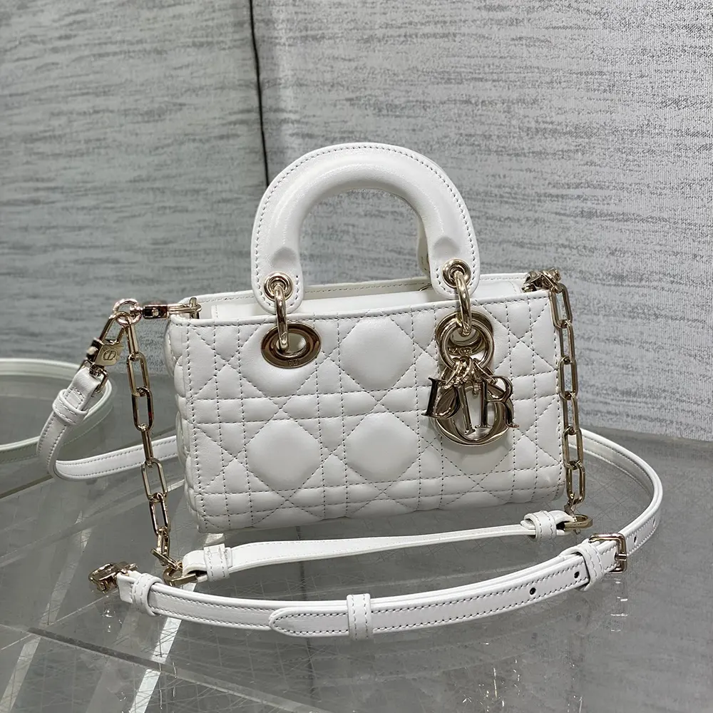 Close-up of Cannage stitching and silver-tone hardware details