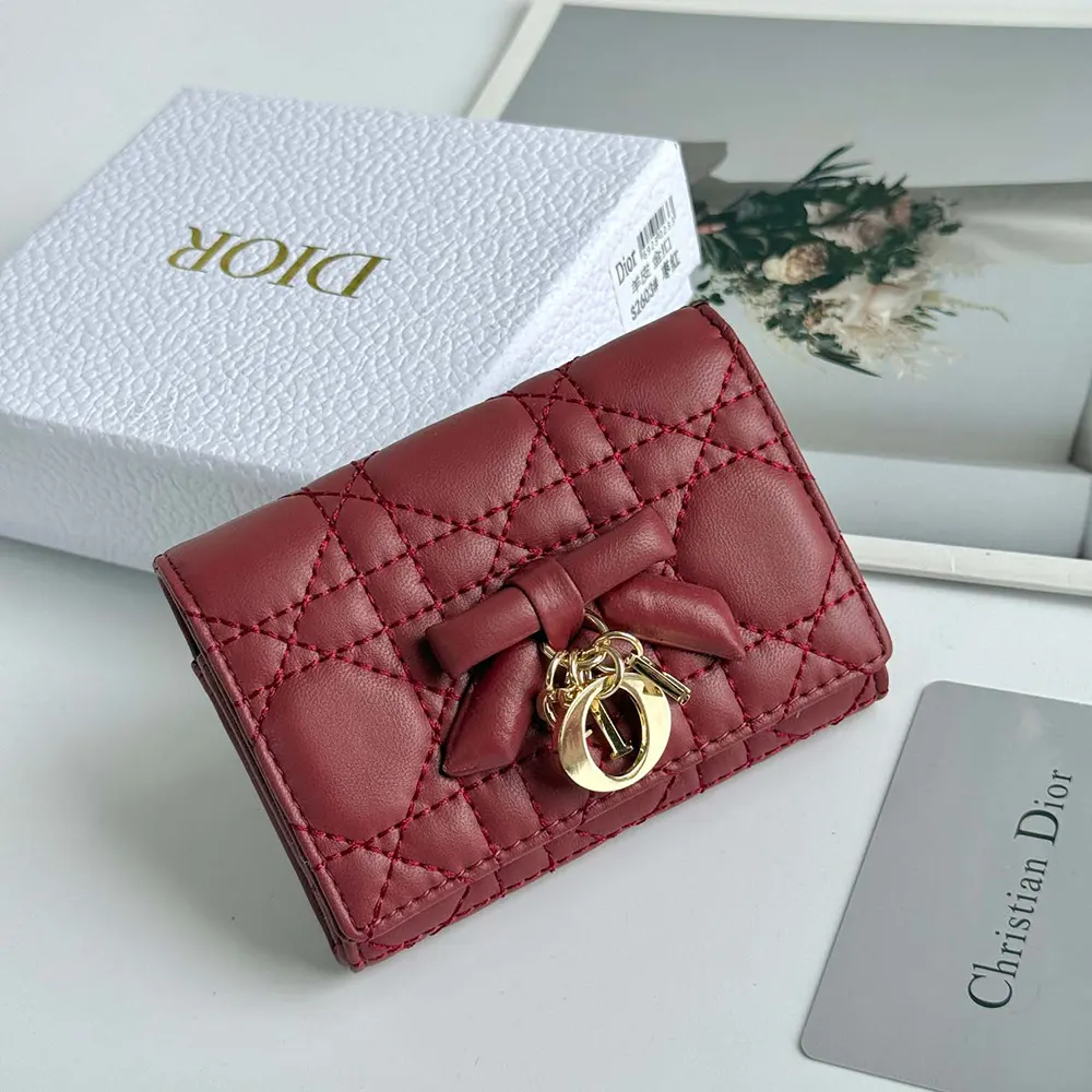 Close-up detail of Cannage stitching on Lady Dior Glycine Wallet in red