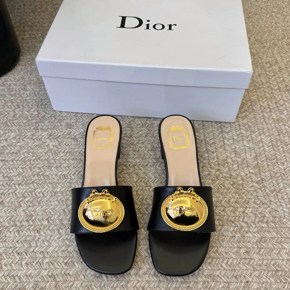 Close-up of Médaillon buckle detail on Dior Women Médaillon Buckle Heeled Slide