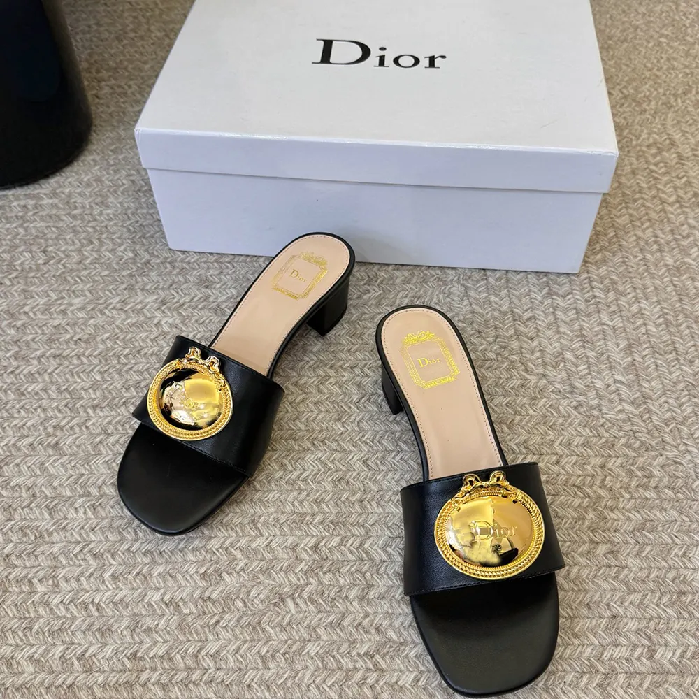 Side profile showing heel height of Dior Women Médaillon Buckle Heeled Slide