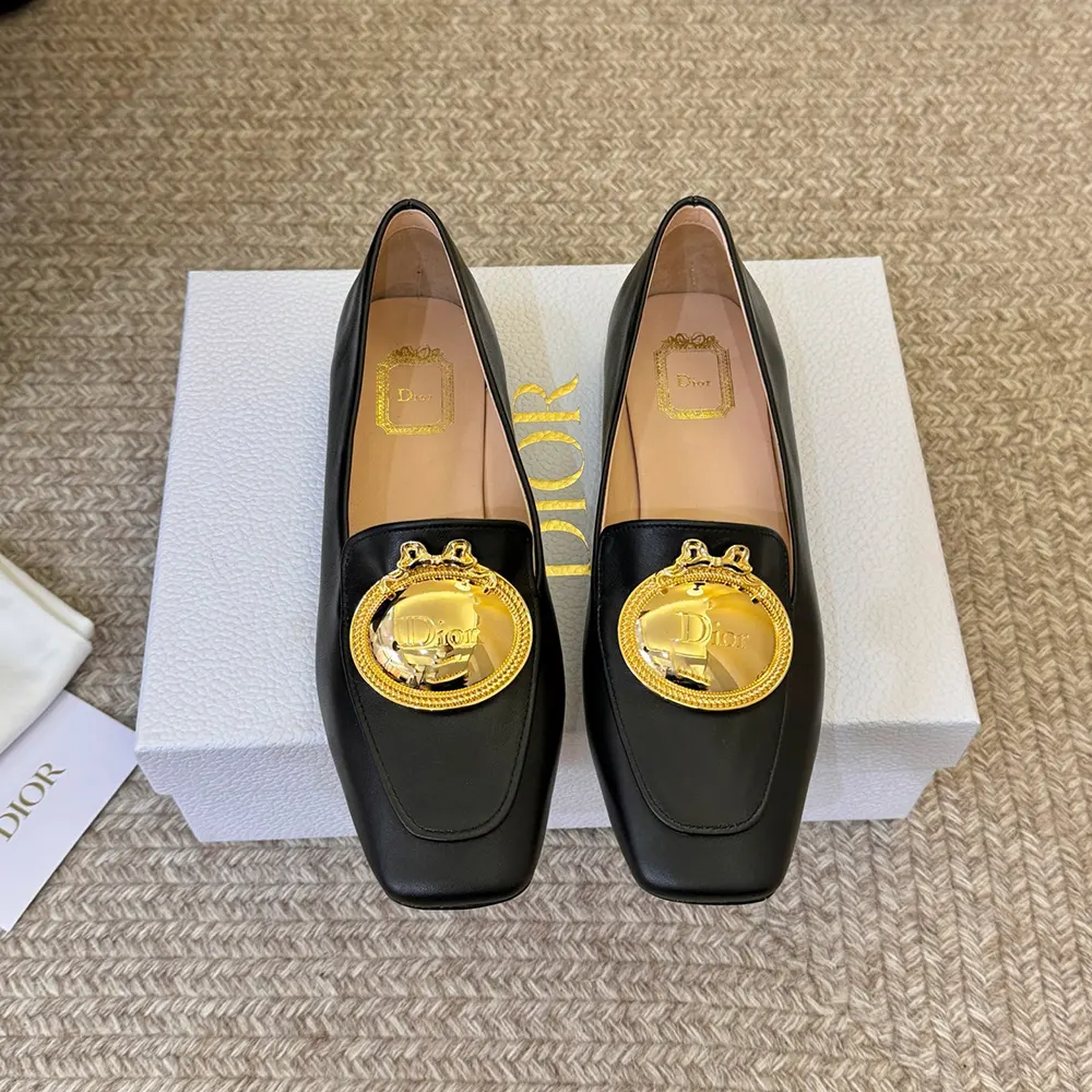 Close-up detail of medaillon buckle on Dior Women Médaillon Buckle Loafer