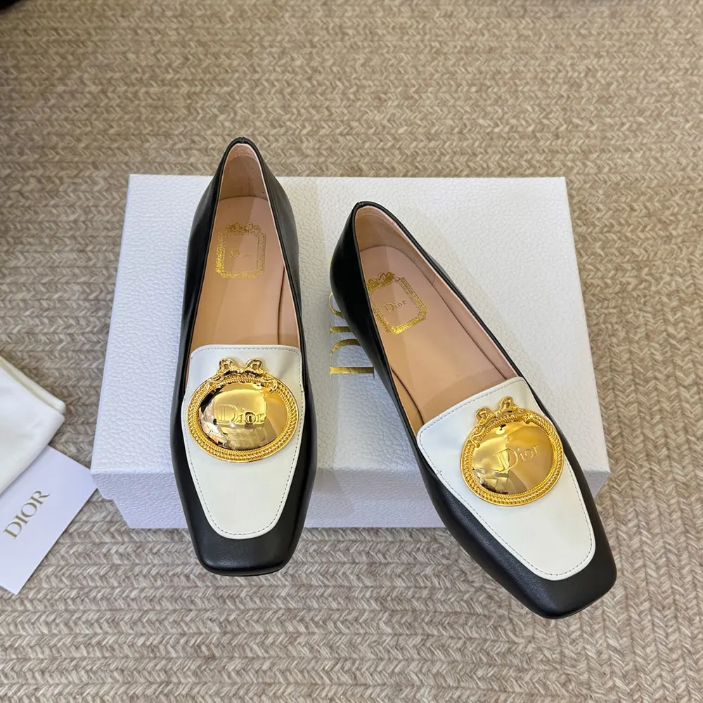 Top-down view showing black and white lambskin on loafer