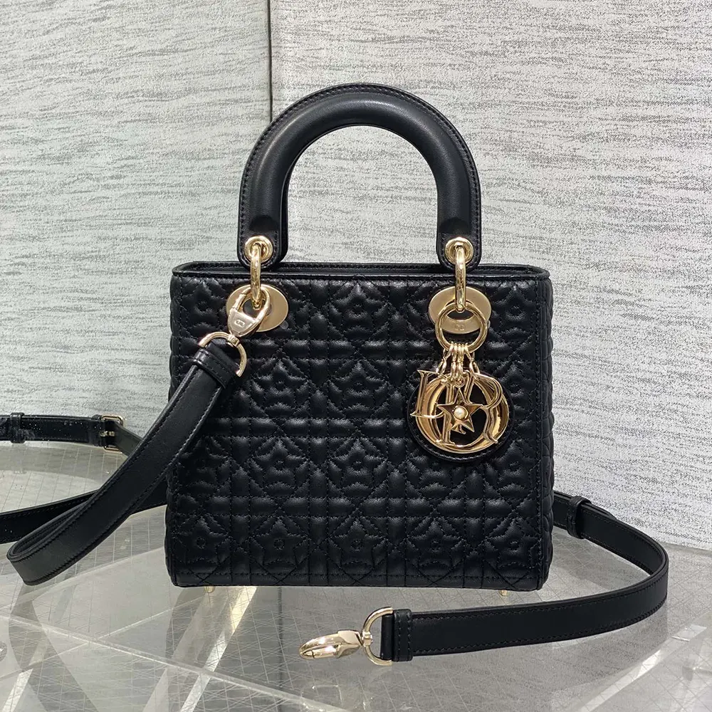 Close-up of star motif and signature Dior charms on Lady Dior Dioramour Bag