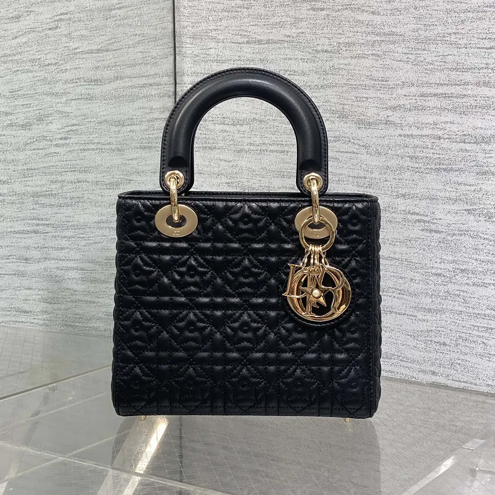 Side angle showing silver chain strap and Cannage stitching on Lady Dior Dioramour Bag