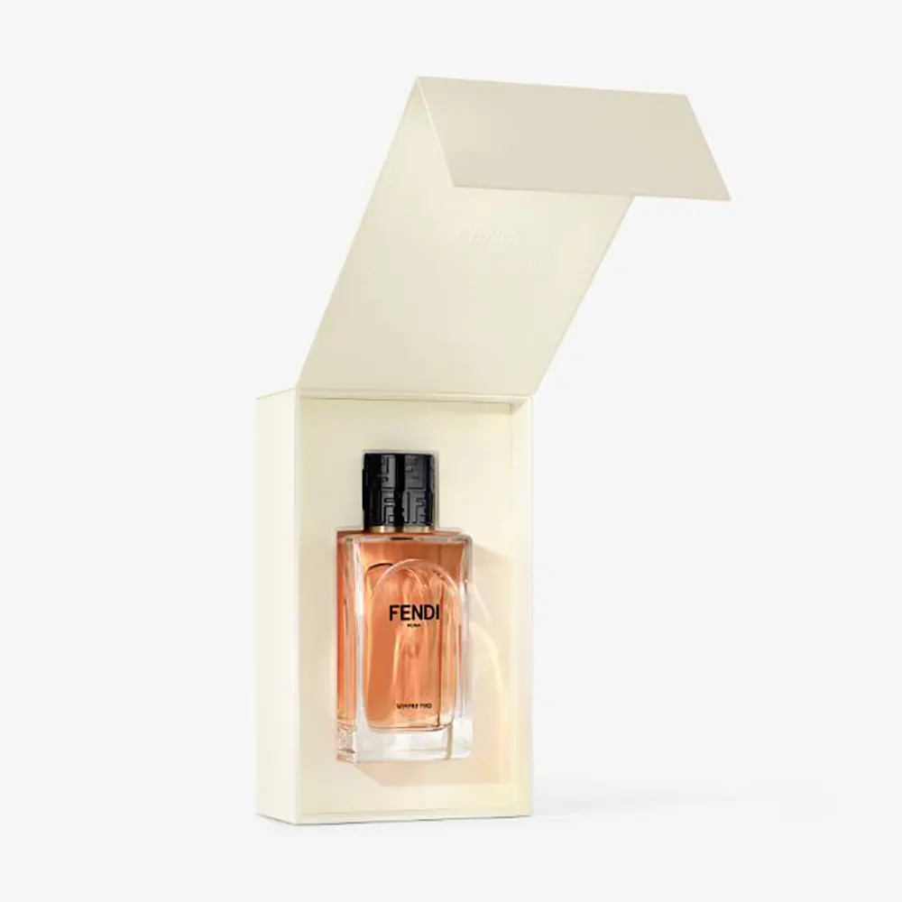 Side angle showing vibrant orange glass of Fendi Sempre Mio bottle