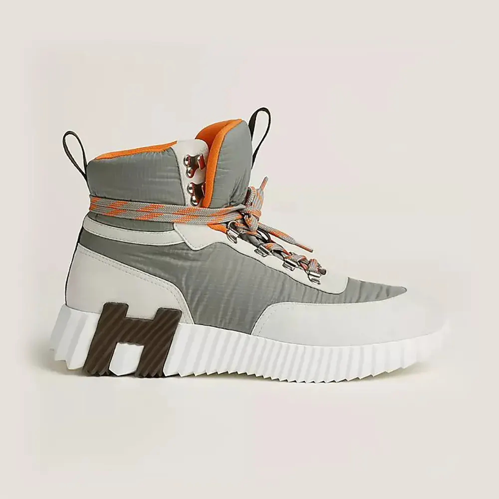 Side view of Hermes Men Klimb Sneaker in gray ripstop fabric