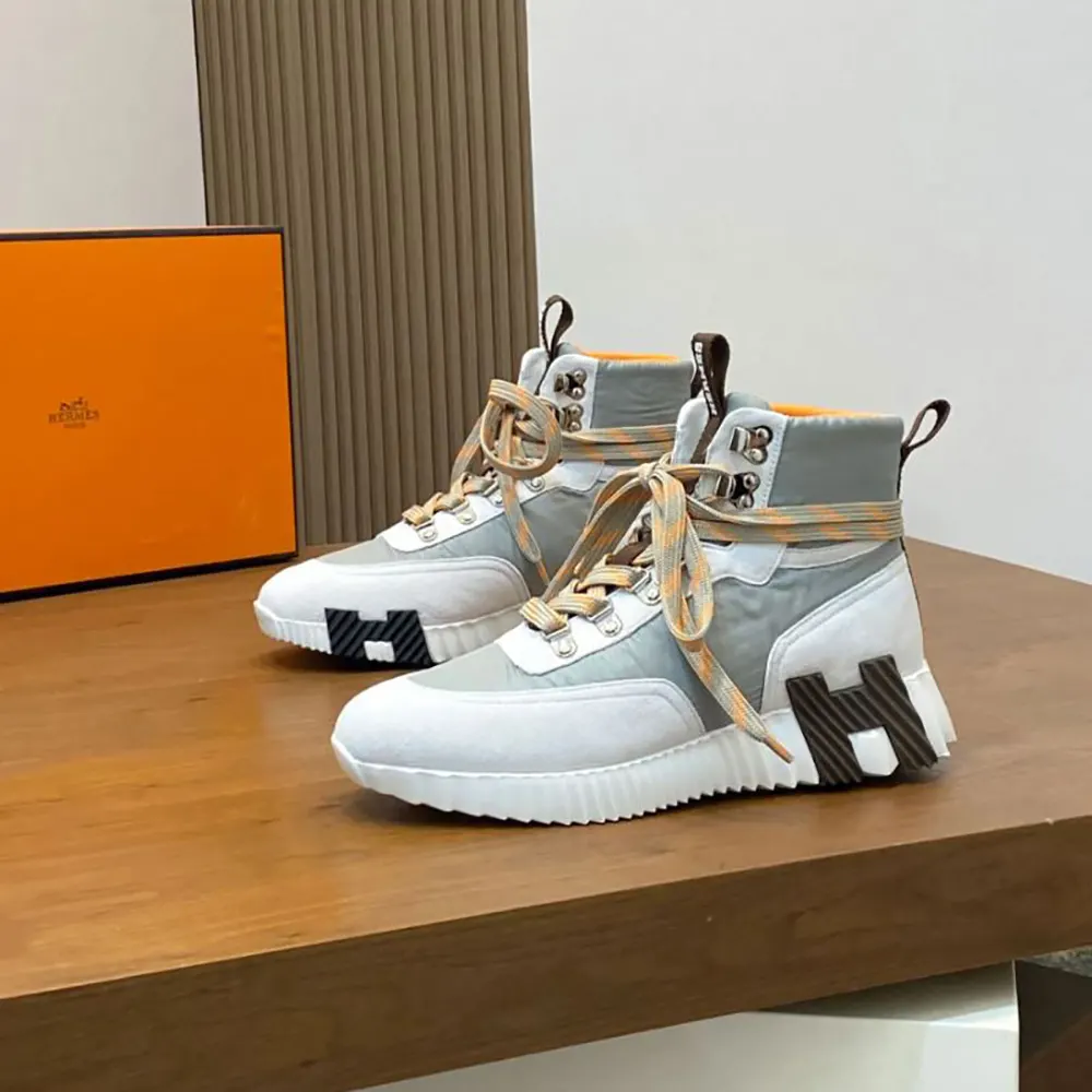 Top angle showing lace-up closure on Hermes Men Klimb Sneaker