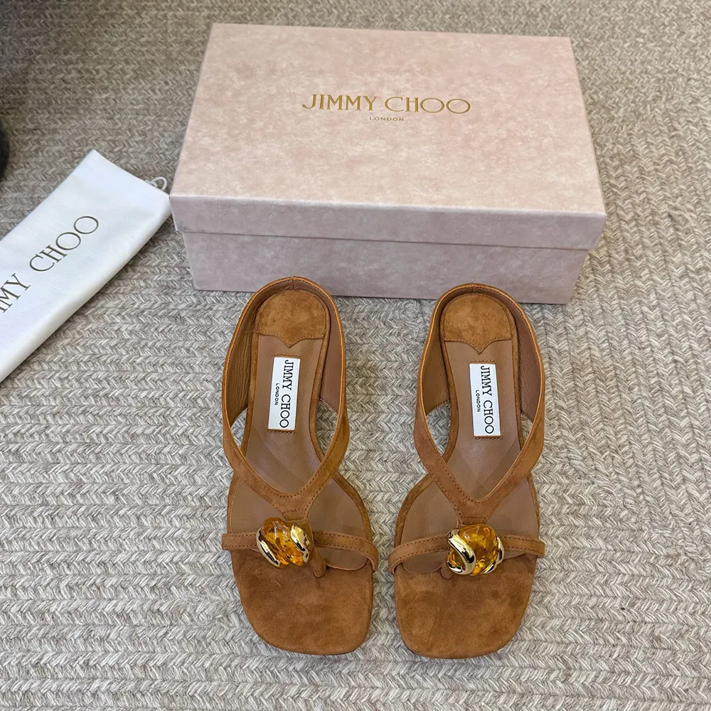 Close-up of sparkling stone embellishment on Jimmy Choo Emeri Stone sandals