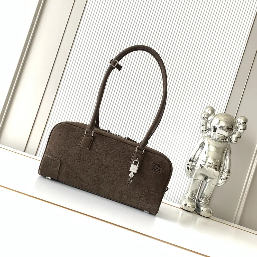 Close-up of gold-tone hardware detail on Loewe Amazona 31 Cropped Bag