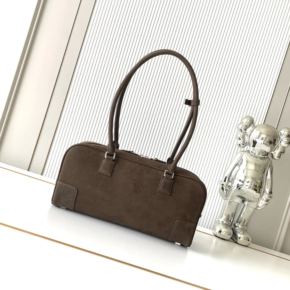 Side profile highlighting silhouette of Loewe Unisex Amazona 31 Cropped Bag