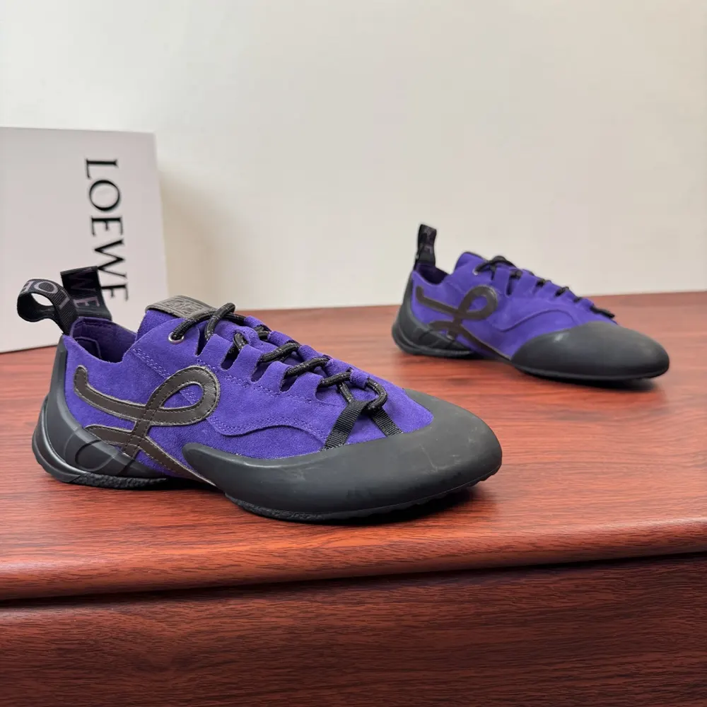 Close-up of purple suede and distinctive Grip sole on Loewe sneaker
