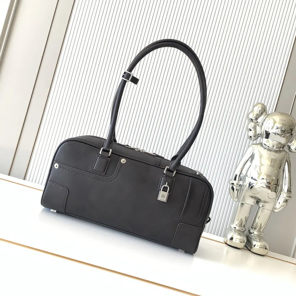 Close-up of polished gold hardware on Loewe Unisex Panta Amazona 31 Cropped Bag