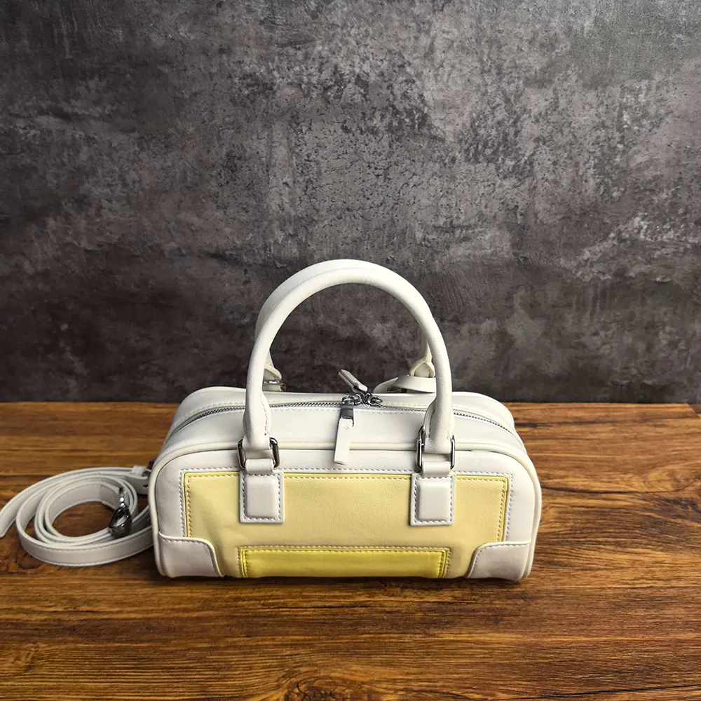 Side profile showing zipper and strap on Loewe Amazona 23 Cropped Bag