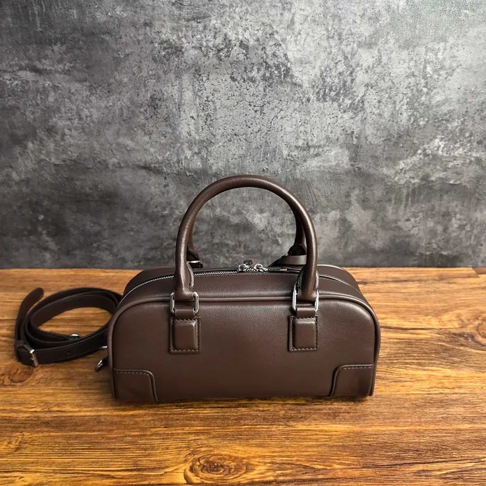 Side profile showing adjustable shoulder strap on Loewe Amazona 23 Cropped Bag