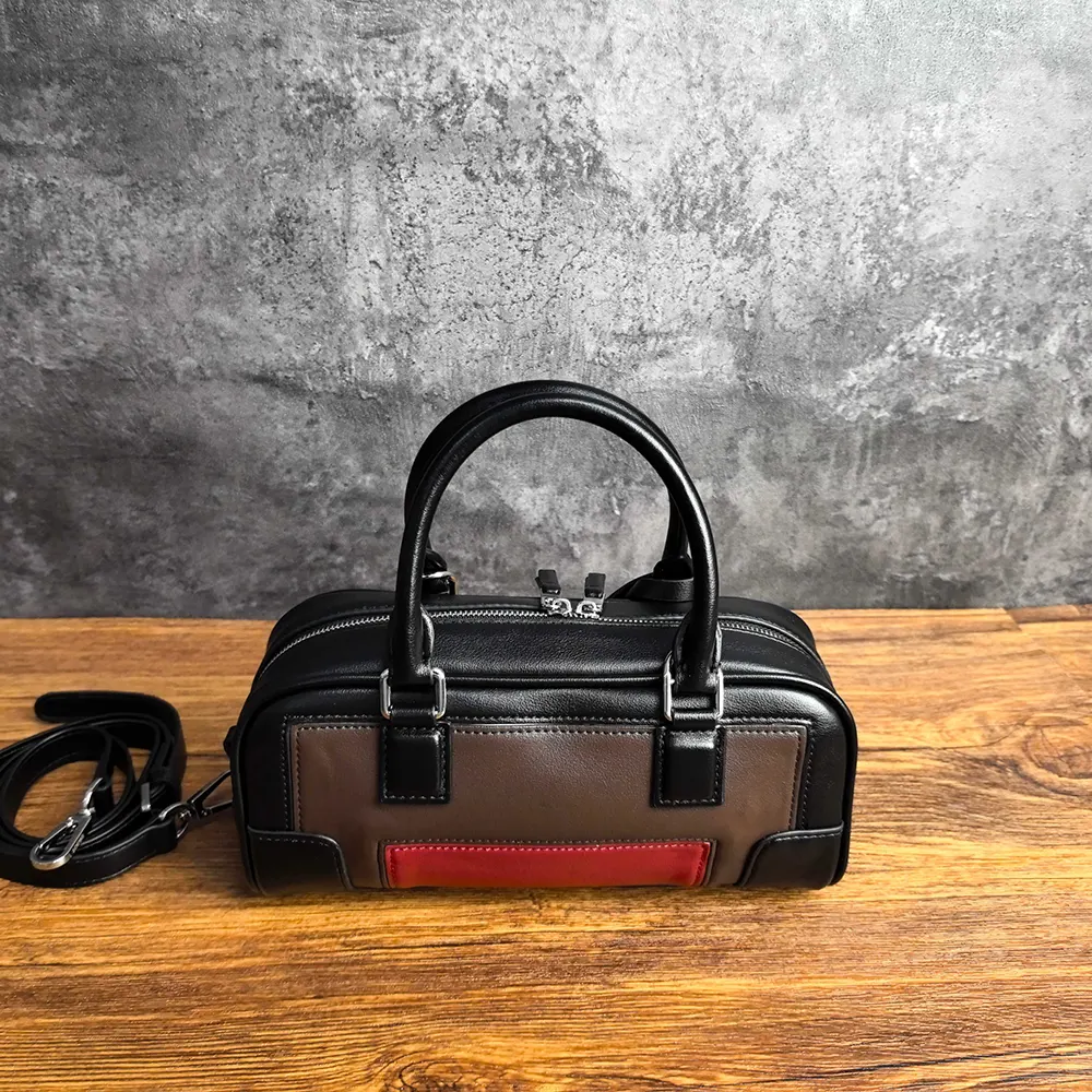 Side profile showing compact silhouette of Loewe Women Amazona 23 Cropped Bag