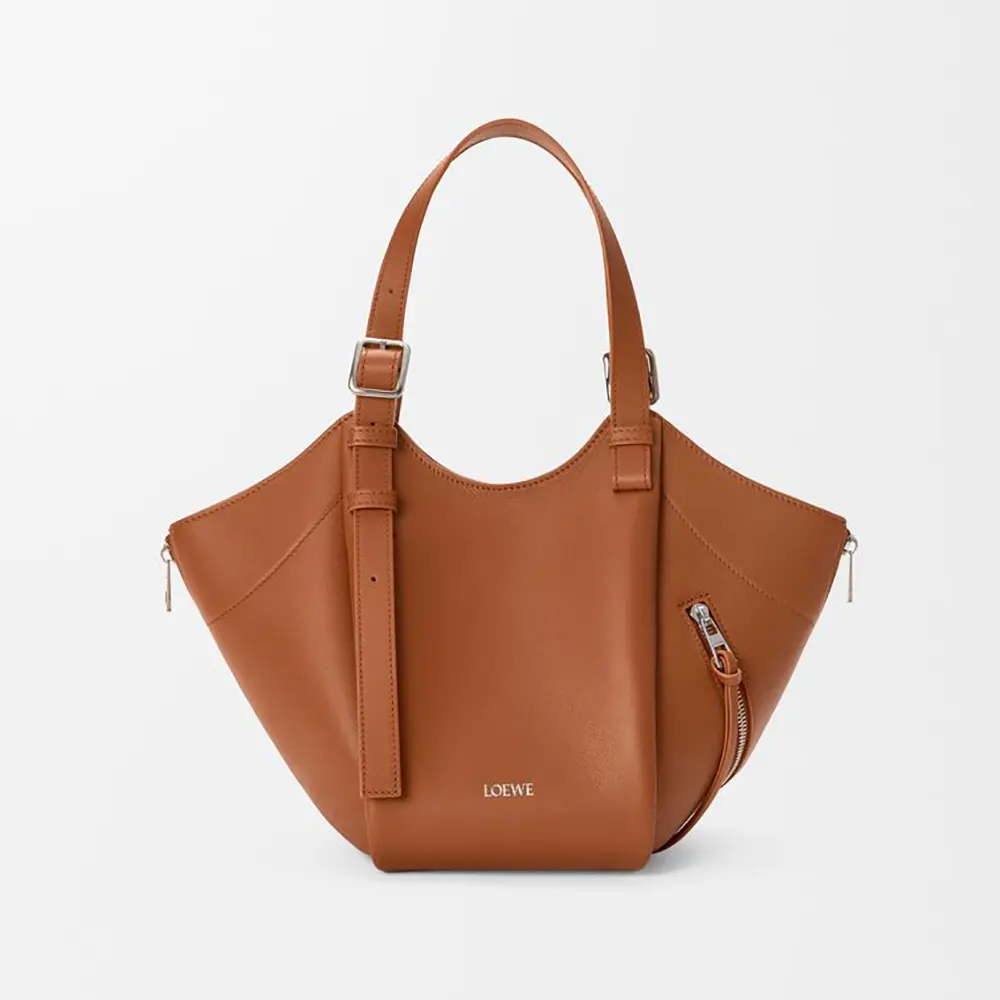 Front view of Loewe Women Hammock Flip Bag in Classic Calfskin brown leather