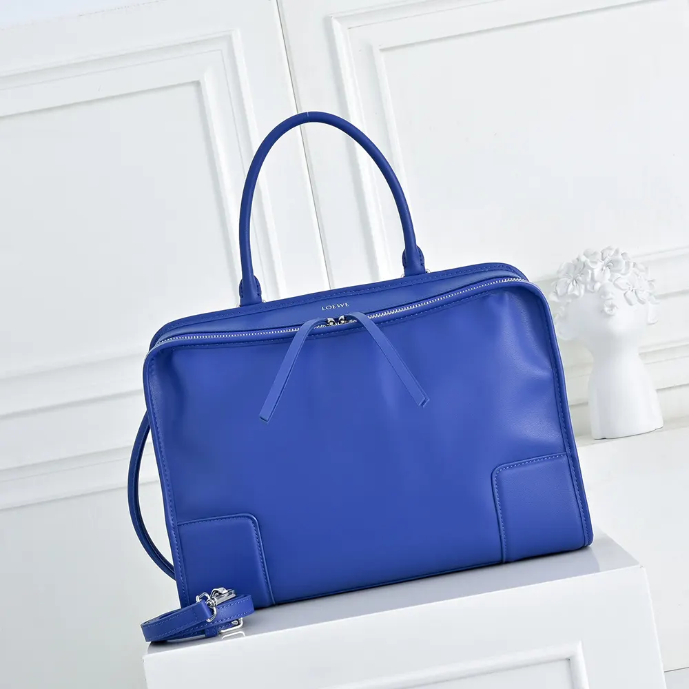 Close-up of gold-tone hardware on Loewe Women Large Amazona 180 Bag