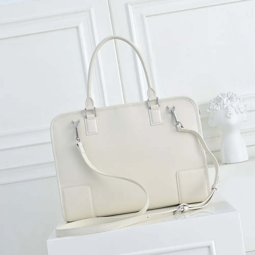 Side angle showing zip closure and adjustable strap on Loewe Large Amazona 180 Bag