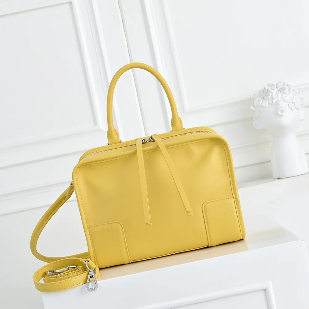 Close-up of flap closure and gold-tone hardware on Loewe Amazona 180 bag