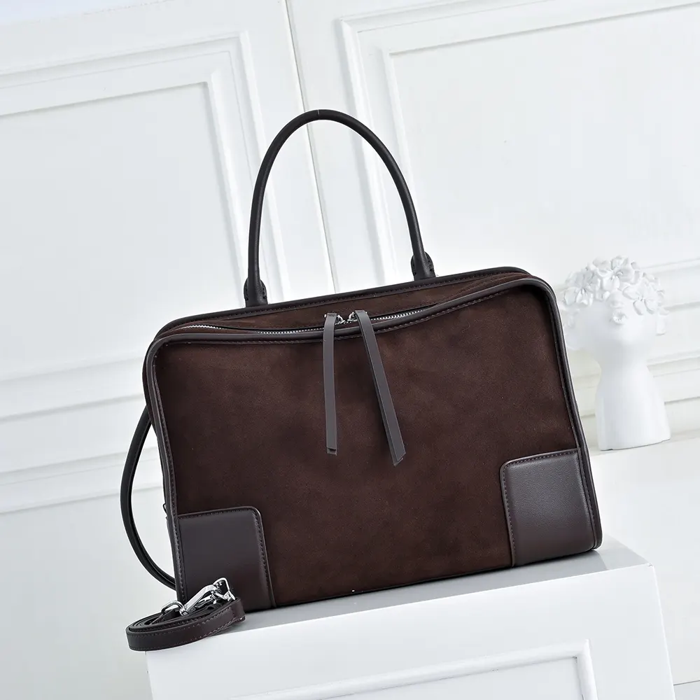 Close-up of gold-tone hardware on Loewe Suede Amazona 180 Bag