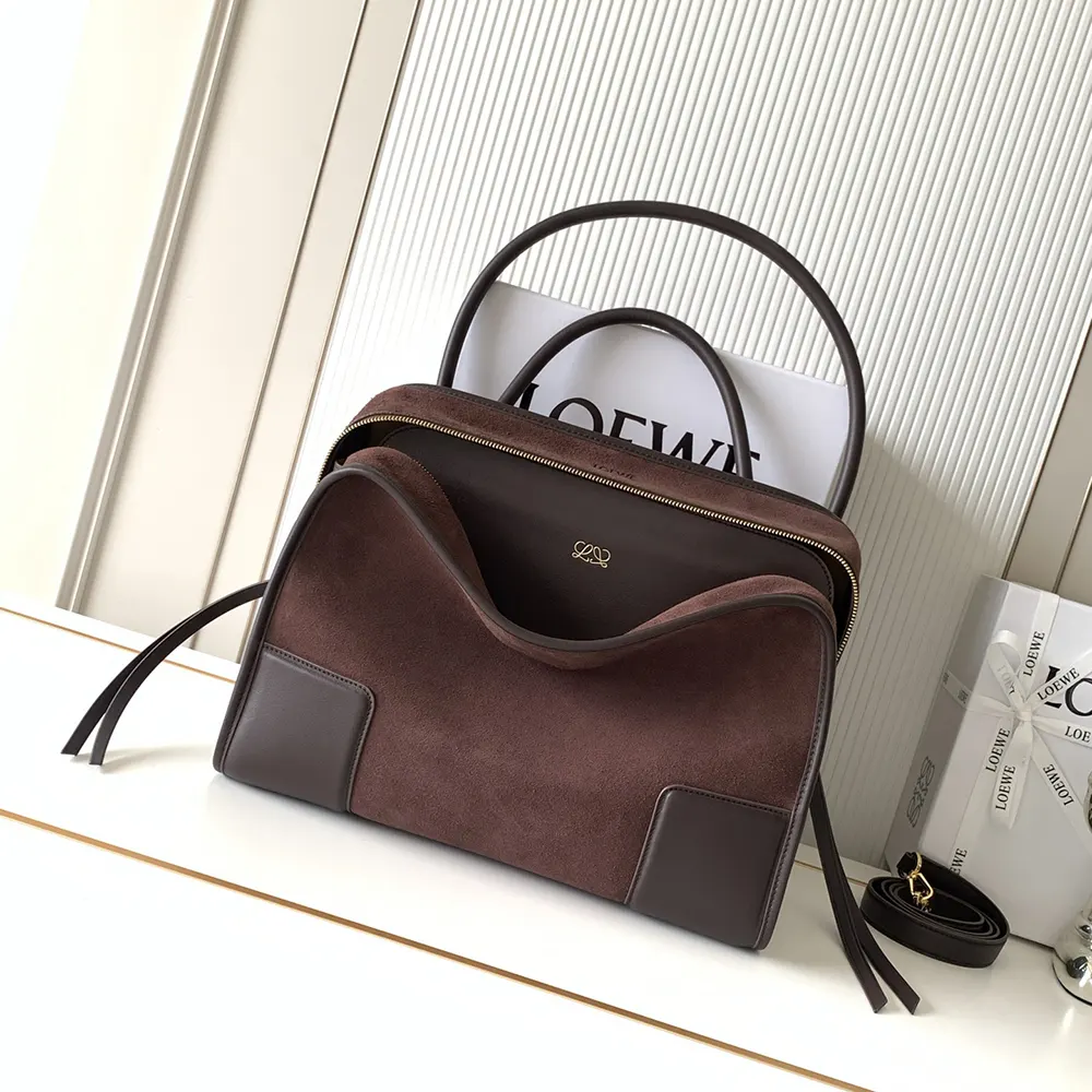 Side angle showing structured silhouette of Loewe Medium Amazona 180 Bag