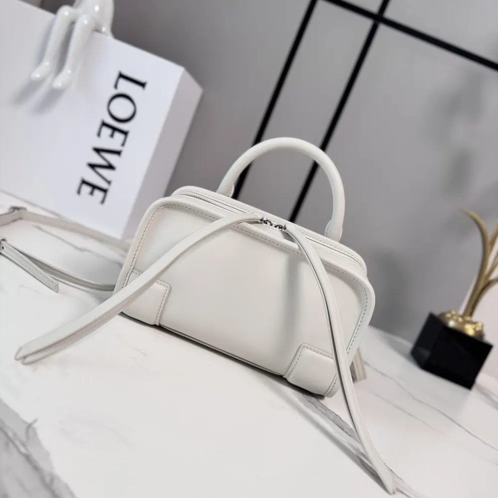 Close-up of Loewe embossed logo and gold-tone hardware on Mini Amazona 180