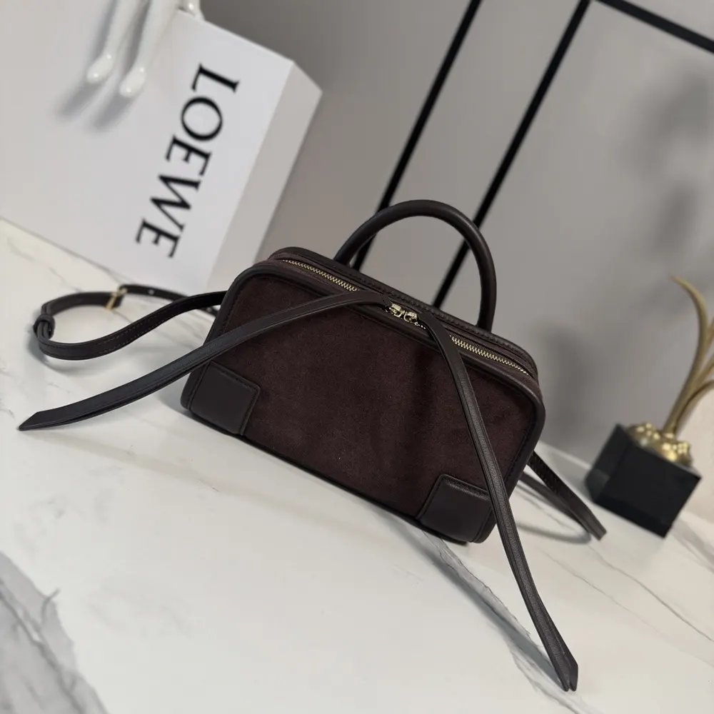 Close-up detail of Loewe embossed logo on Mini Amazona 180 Bag