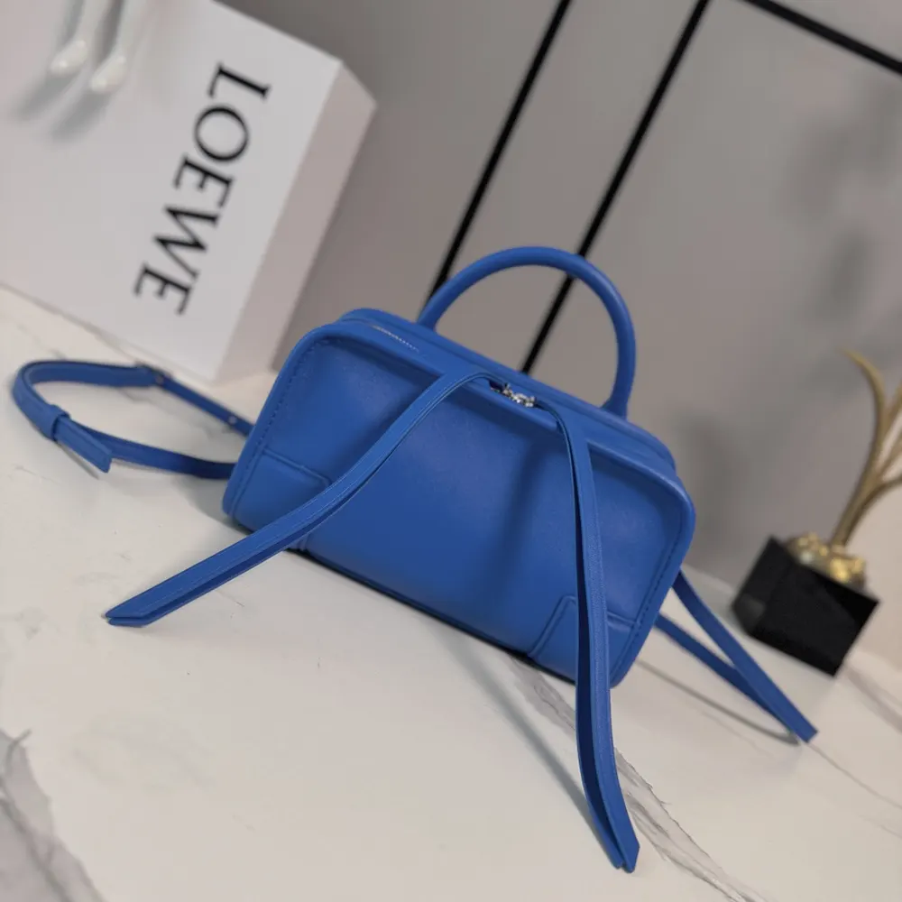 Close-up of royal azur suede texture on Loewe Mini Amazona 180 Bag